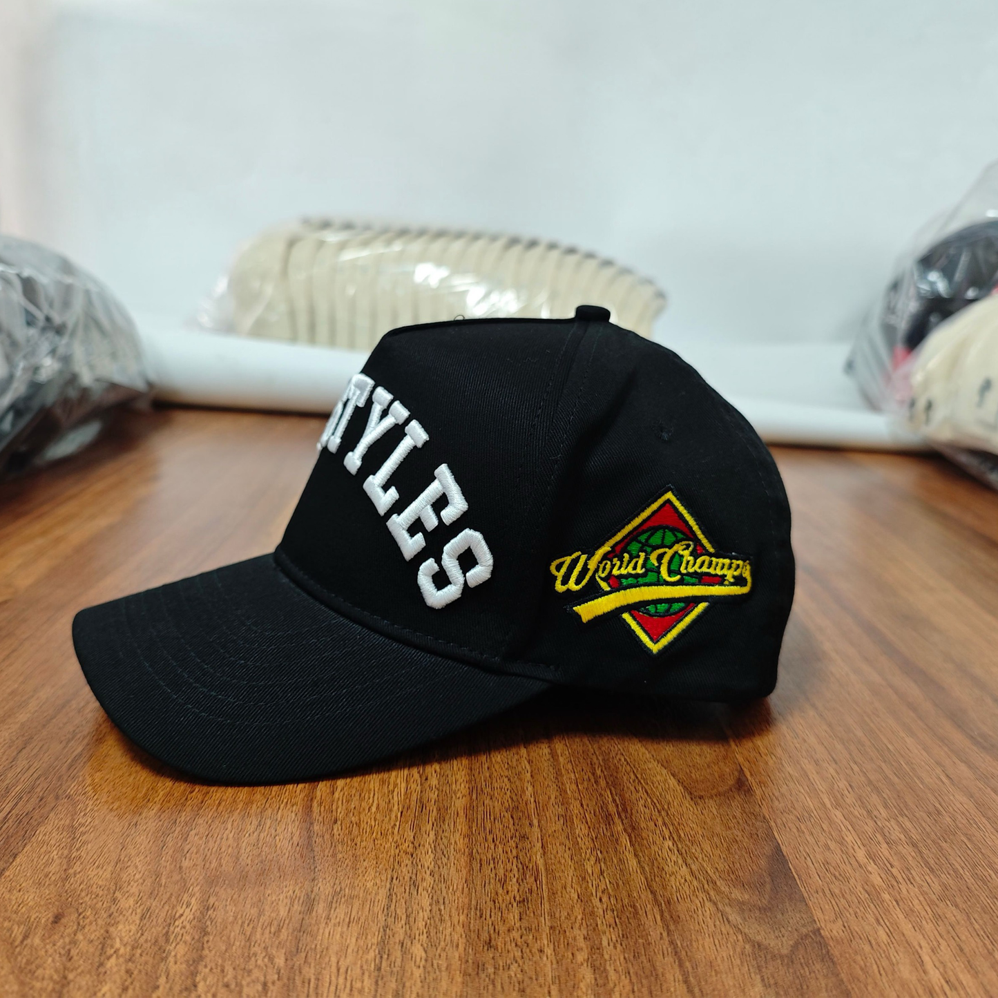 AXG (WORLD CHAMPS) SNAPBACKS